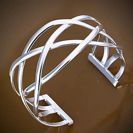 XO Cuff Style Bracelets polished in Silver